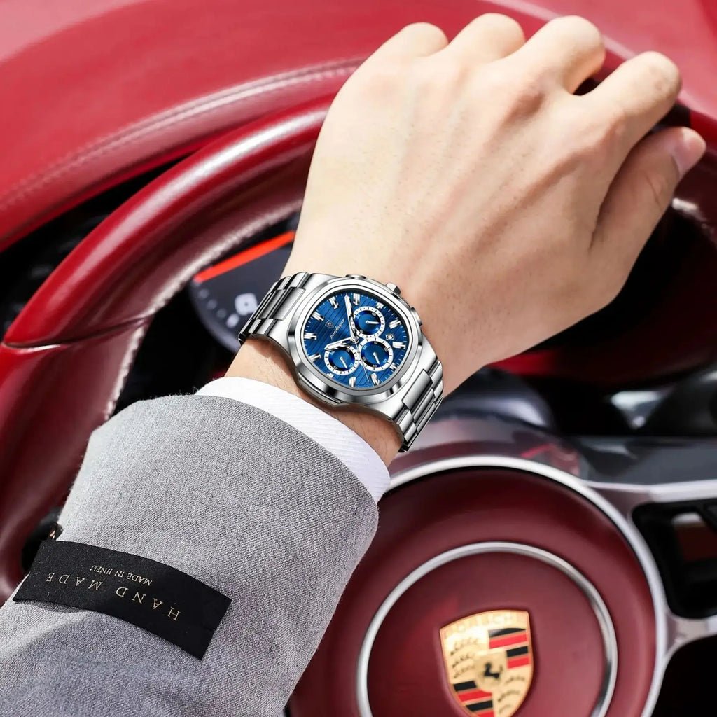 Luxury men’s blue chronograph watch with stainless steel bracelet, sporty dial, and multi-subdial features”